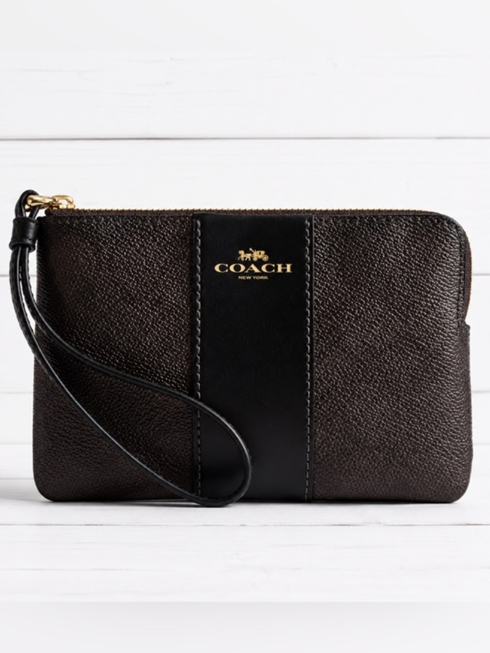 COACH  corner zip wristlet in signature C pattern brown and black